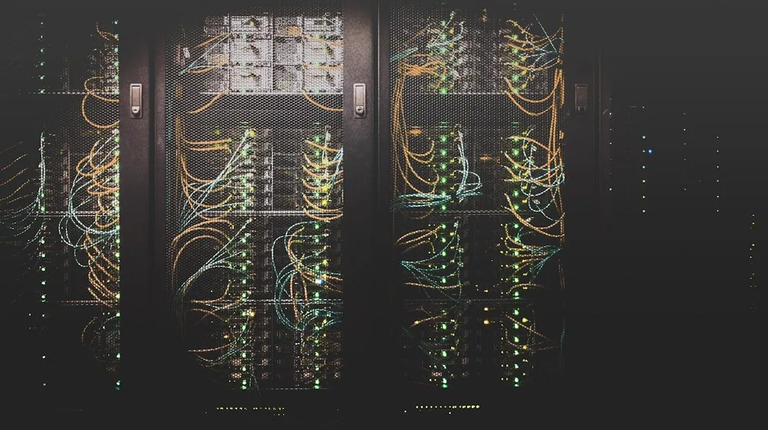 A data centre server aisle, standing for an AI tool going offline